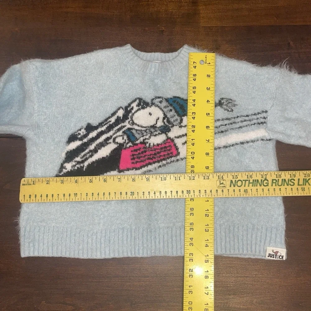 Girls Snoopy Peanuts Sledding Fuzzy Knit Sweater by Justice- Size Small (7/8)